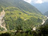 
Trail Towards Chomrong Across The Valley From Chiule With Khumnu Khola Below On The Way From Ghorepani To Chomrong
